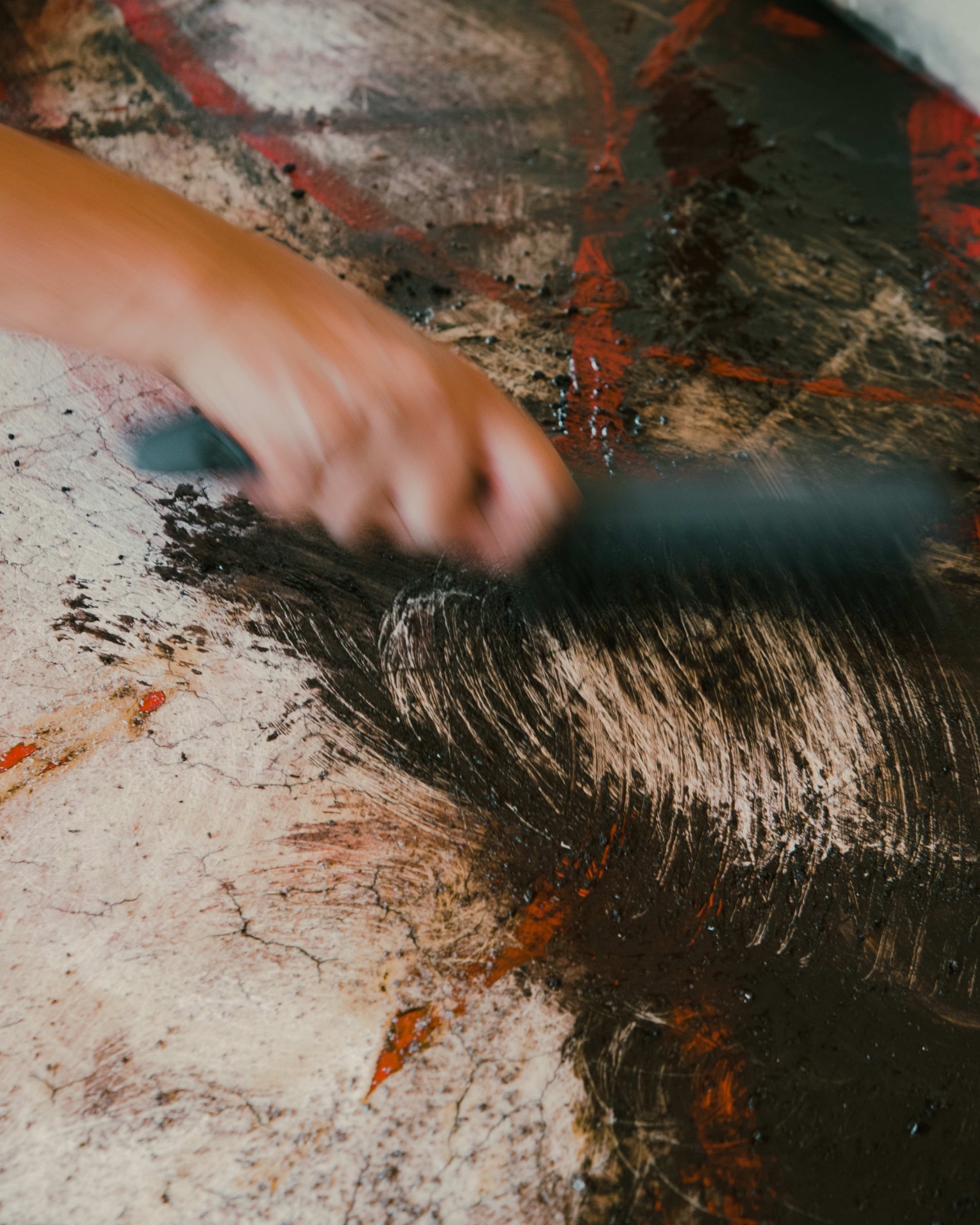 Artist and guest working together during a private art session in Tulum